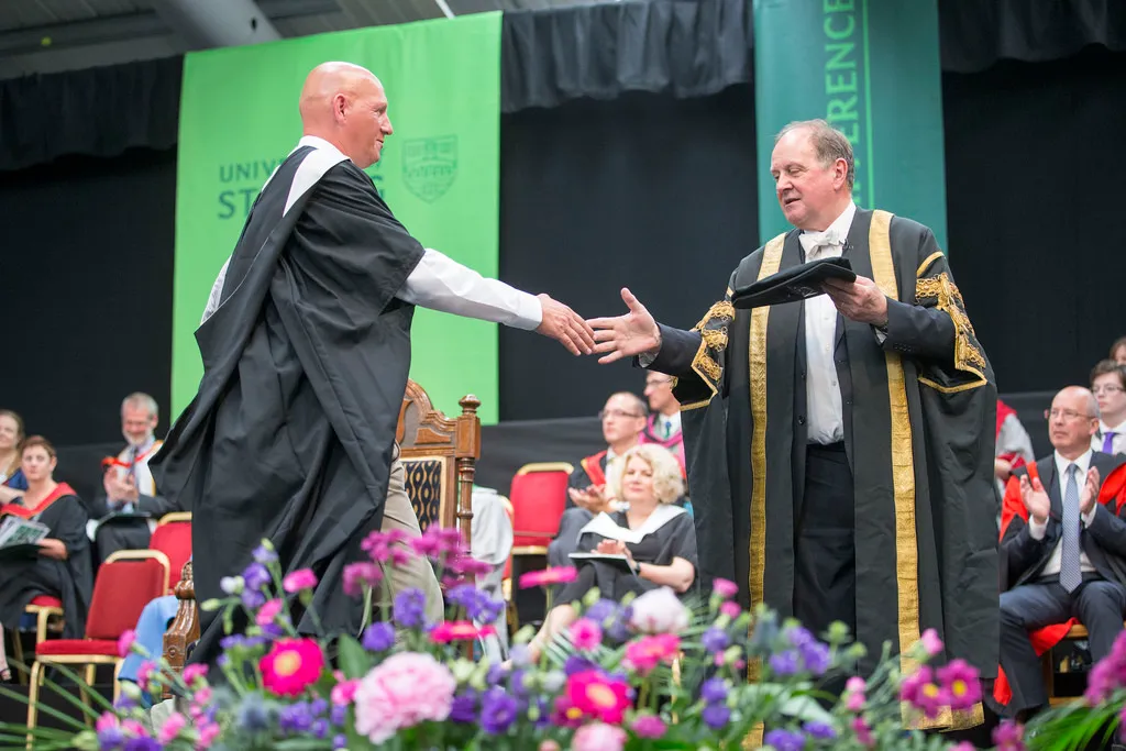 Graduate receiving degree from Chancellor