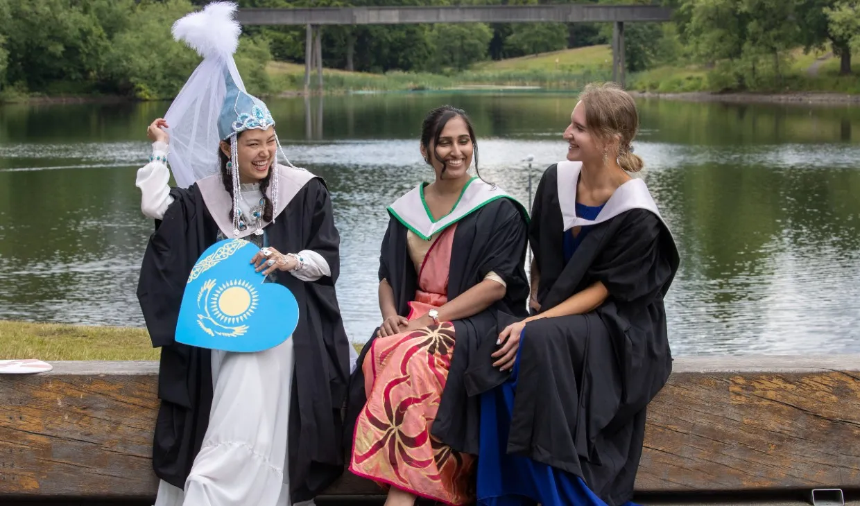 Kazakhstan national dress graduate with friends