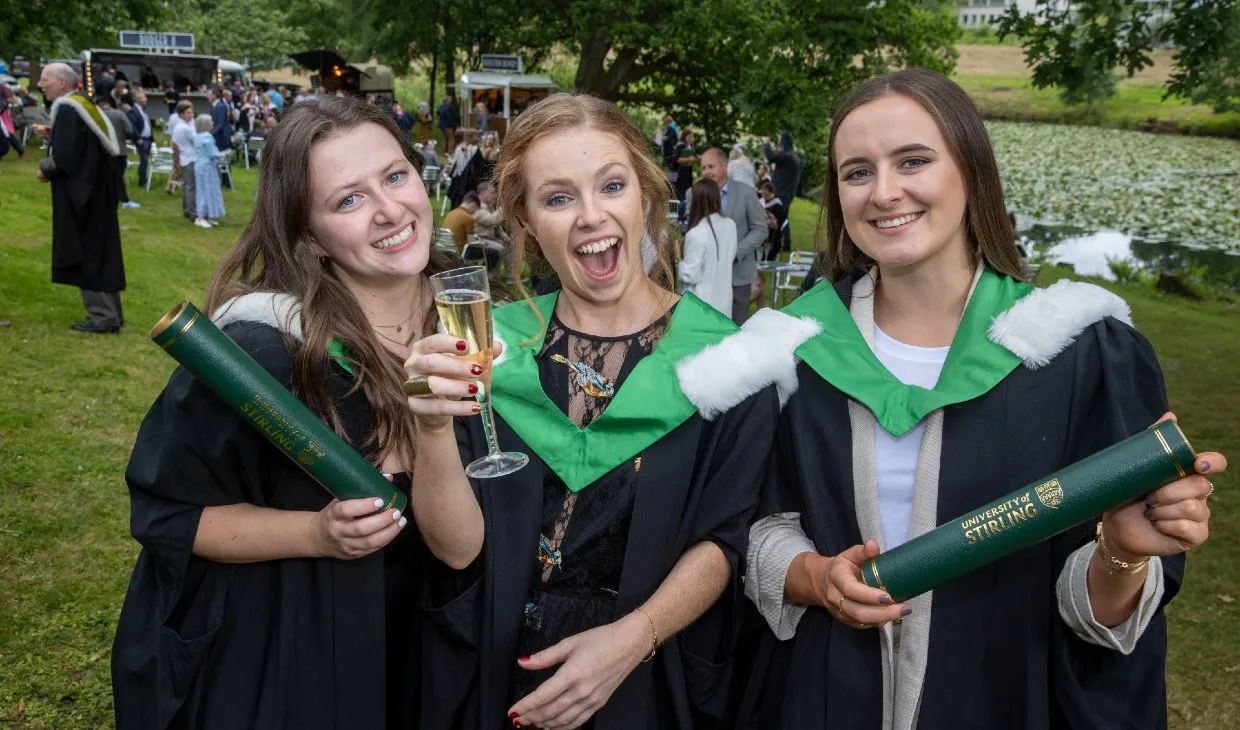 Graduates celebrate at the garden party reception