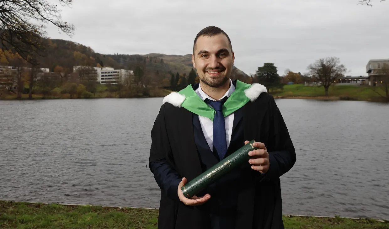 University of Stirling winter graduates celebrating - p2b