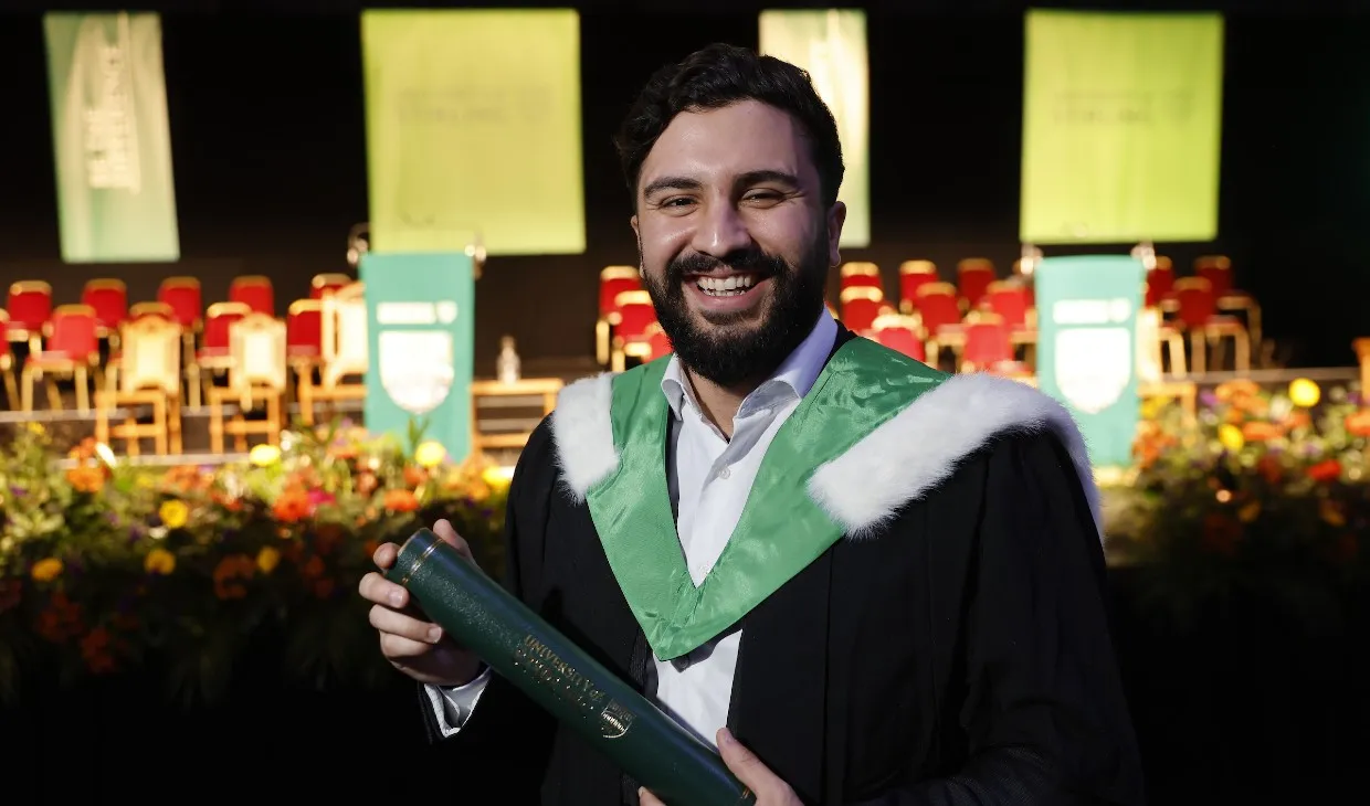 University of Stirling winter graduates celebrating - p4b