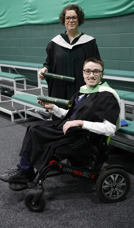 University of Stirling winter graduates celebrating - p5b