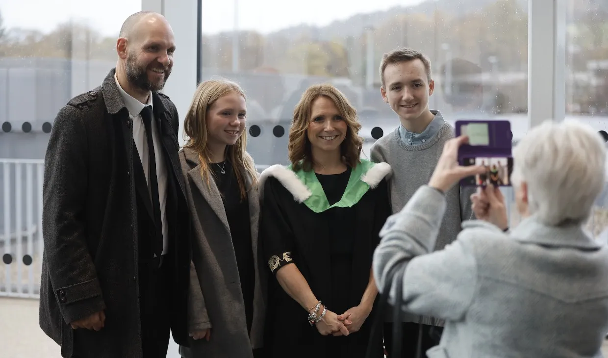 University of Stirling winter graduates celebrating - p6b