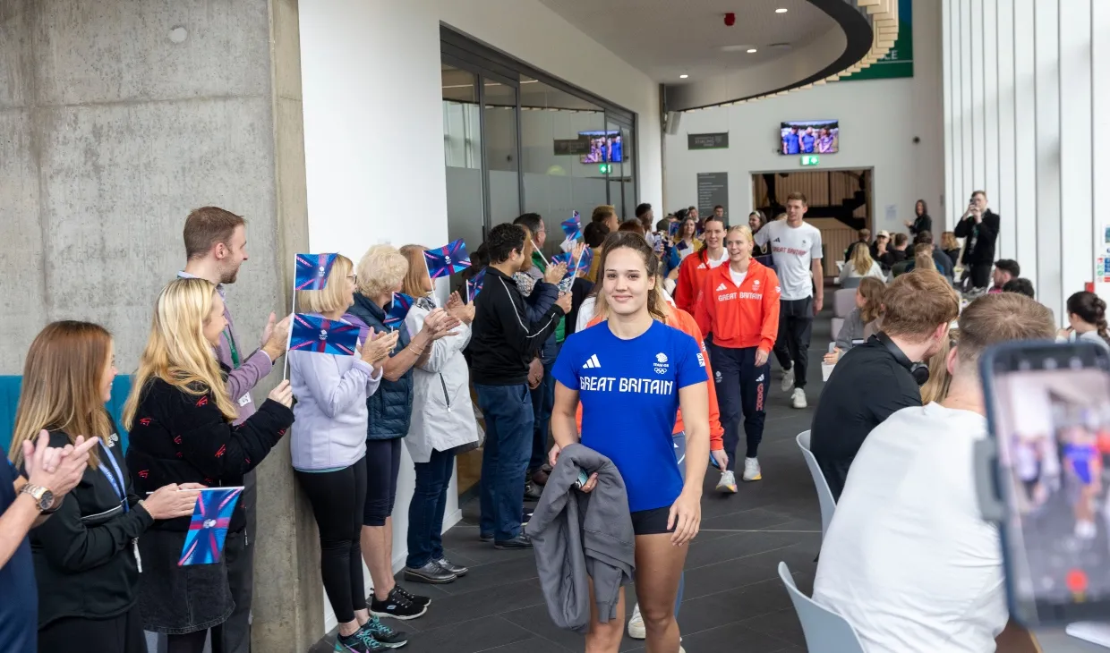 Olympians receive a warm welcome on their return to campus.