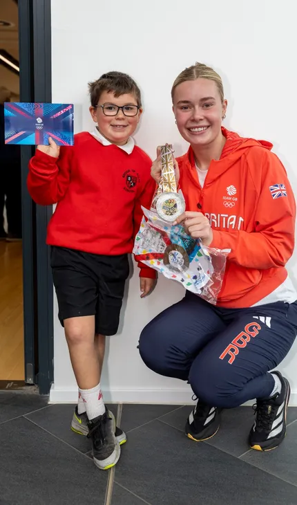 Olympians receive a warm welcome on their return to campus.