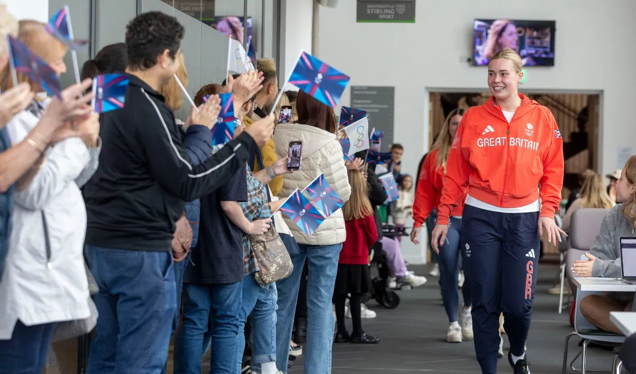 Olympians receive a warm welcome on their return to campus.