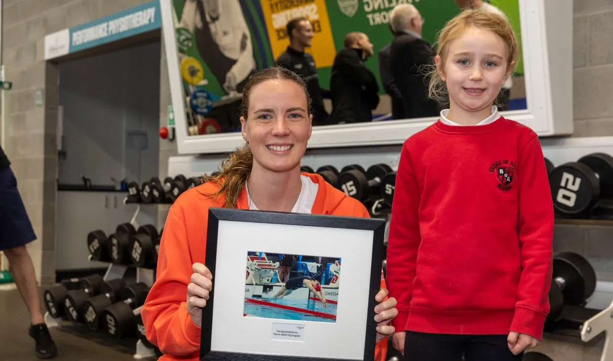 Olympians receive a warm welcome on their return to campus.