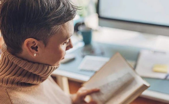 Person reading a book