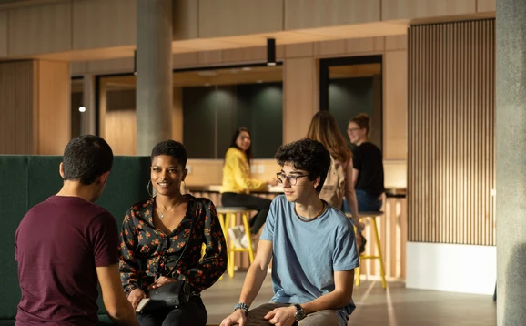Group of students sitting in Campus Central