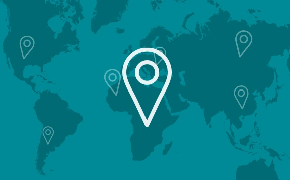 Stylised graphic of a world with location marker
