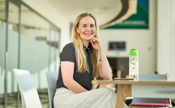 Staff member sitting in the Sports Centre cafe