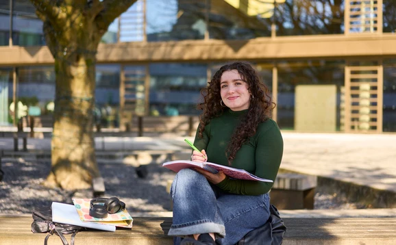 Student holding a folder