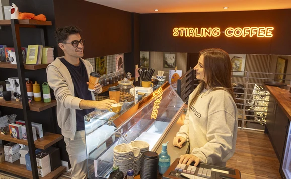 two people talking in coffee shop