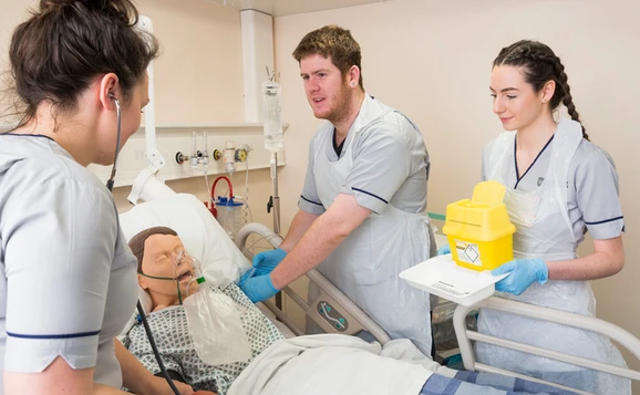 Nursing students in a ward