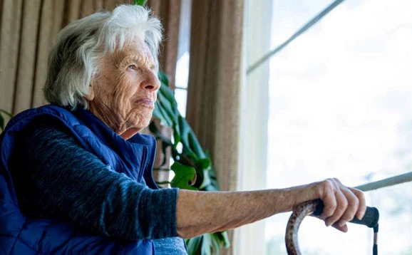 Person looking out of a window