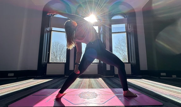 Female standing in yoga pose
