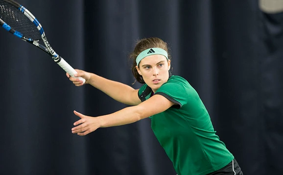 Maia Lumdsen hitting tennis ball
