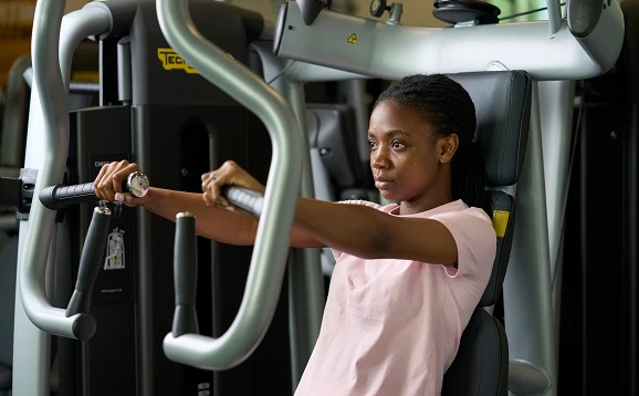 Person using gym equipment