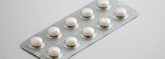 Tablets in a plastic and foil packet