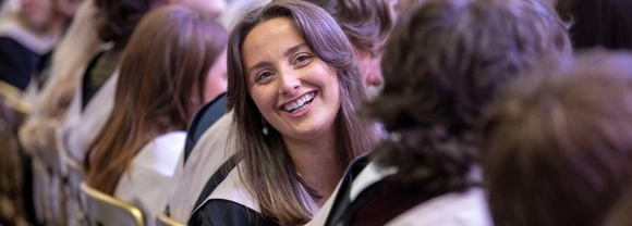 Graduands in graduation hall