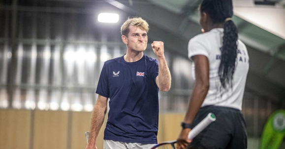 Liam Hignett celebrates in France.