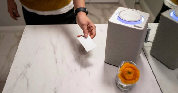 hand operating smart speaker control