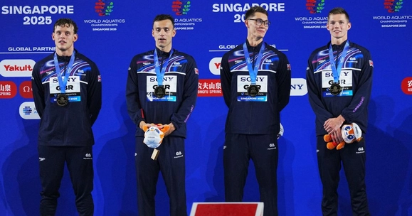 Great Britain won their first gold medal at the 2025 World Aquatics Championships in Singapore with victory in the men's 4x200m freestyle relay.  Olympic champions Matt Richards, James Guy, Jack McMillan and Duncan Scott triumphed in the final race of day six in six minutes and 59.84 seconds.