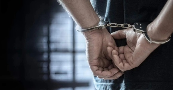 hands in handcuffs