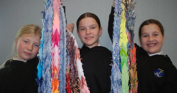 S1 students Rosalind Macleod, Darcie Williams and Eva Harper with paper cranes