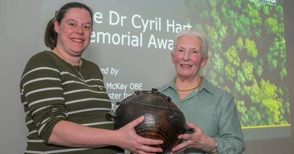 Sarah Watts (left) is presented with The Dr Cyril Hart Memorial Award by Dr Helen McKay OBE FICFor CEnv, Chair of The Scottish Forestry Trust’s Projects and Research Committee