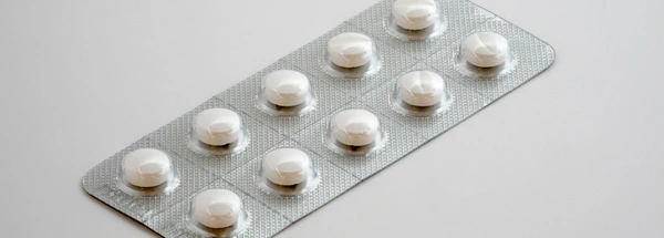 Tablets in a plastic and foil packet