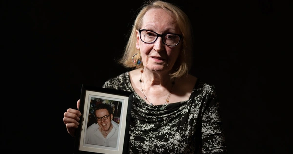 woman holding photo