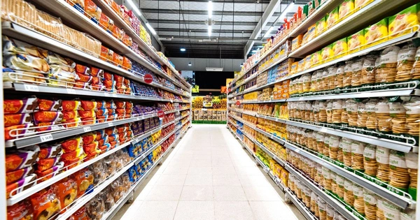 A well stocked supermarket with lots of colourful and busy shelves
