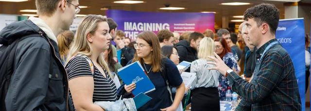 Students at a career fair stall